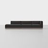 A modern, modular dark gray sectional sofa with low backrests and wooden base, set against a plain white background.