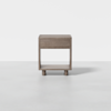 A modern, minimalist wooden nightstand with a single drawer and an open lower shelf, set against a plain white background.