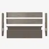 Five pieces of a disassembled bed frame, including two side rails, two horizontal slats, and a rectangular upholstered headboard, all laid out on a white background.