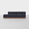 A modern, dark navy sectional sofa with clean lines, low profile, and a wooden base, set against a plain light gray background.