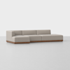 A modern L-shaped sectional sofa with light beige upholstery and a wooden base, set against a plain white background.
