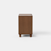 A modern wooden nightstand with an open lower shelf and one drawer partially pulled out, standing on four short legs against a plain white background.