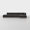 A modern, dark gray, L-shaped sectional sofa with clean lines and a low-profile design sits on a light gray floor against a plain white background.
