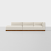 A modern, minimalist beige sectional sofa with three seats, a left chaise lounge, and a low wooden base, set against a plain white background.
