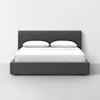 A modern, low-profile bed with a dark gray upholstered frame and headboard, made up with white sheets, two pillows, and a minimalist design against a plain white wall.