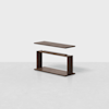 A dark wooden table with a rectangular top shown floating above its rectangular base, against a plain light background.