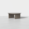 A round, modern wooden coffee table with a smooth top and two wide, flat legs forming a cross-shaped base, set against a plain white background.
