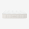 A white, rectangular mattress with a quilted top and the brand name THUMA embroidered on the side, viewed from the front against a plain white background.