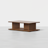 A modern rectangular wooden coffee table with a flat top, open central compartment, and solid base, set against a plain white background.