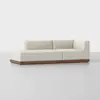 A modern L-shaped sectional sofa with cream-colored upholstery and a wooden base, set against a plain white background.