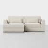 A modern, off-white sectional sofa with clean lines, low backs, and two matching rectangular cushions, set against a plain white background.