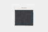 A square swatch of dark gray fabric with a fine, even texture and zigzag cut edges, displayed on a plain white background.
