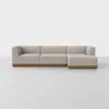 A modern L-shaped beige sectional sofa with clean lines, low backrests, and a wooden base, set against a plain white background.