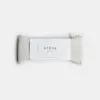 A light beige linen eye pillow with a white label in the center that reads BODHA Ritual Aromatherapy Eye Pillow on a plain white background.