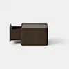A dark brown, rectangular wooden box sits centered on a smooth, light gray surface against a plain white background.
