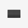 A rectangular, dark gray object with a subtle texture and a vertical line dividing it into two equal sections, set against a plain white background.