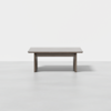 A simple, rectangular wooden table with a natural finish, shown against a plain white background. The table has sturdy, straight legs and a smooth, flat surface.