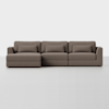 A modern, brown sectional sofa with three seat cushions, an attached chaise on the left, matching back cushions, and three rectangular bolster pillows, set against a plain white background.