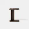 A modern, dark brown side table with a rectangular marble top and a T-shaped wooden base, set against a plain white background.