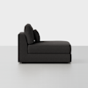 A modern, dark gray chaise lounge with two cushions, shown from the side against a plain light background. The chaise has clean lines and a minimalist design.