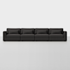 A modern, dark gray four-seater sectional sofa with low arms and matching rectangular cushions, set against a plain white background.