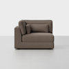 A modern, brown upholstered sectional sofa with a left-arm chaise design, featuring plush back and side cushions, set against a plain white background.