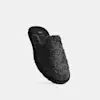 A single dark gray, fuzzy slip-on slipper with a black sole, shown at an angle on a plain white background.
