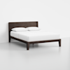 A dark wood bed frame with a rectangular headboard, neatly made with a white mattress and two white pillows, set against a plain white background.