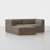 A modern, L-shaped sectional sofa with brown fabric upholstery and a wooden base, set against a plain white background.