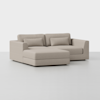 A modern beige sectional sofa with clean lines, low wide arms, and two back cushions, set on a flat surface against a plain white background.
