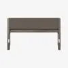 A modern headboard with a rectangular shape, featuring a padded, gray upholstered panel and a wooden frame with legs, displayed against a plain white background.