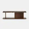 Rectangular coffee table with a dark marble top, wooden base, one vertical support on the left, and a central rectangular wooden panel, set against a plain white background.