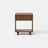 A modern wooden nightstand with a single drawer and an open lower shelf, standing on four short cylindrical legs against a plain white background.