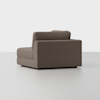 A modern, brown, upholstered, left-arm chaise lounge with clean lines is positioned against a plain white background.