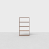 A simple, freestanding, four-shelf wooden bookcase is centered on a plain, light-colored floor against a blank white background. The design is minimalist and modern.