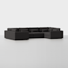 A modern, dark gray sectional sofa with clean lines and multiple seat cushions, corner configuration, and matching back and side pillows, set in a minimal white space.