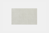 Square, light gray rug with a subtle, smooth texture, centered on a white background.