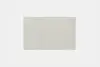 Square, light gray rug with a subtle, smooth texture, centered on a white background.