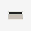 A rectangular beige wall organizer with a black horizontal stripe at the top, mounted on a white background. The organizer has a fabric texture and a small tag on the bottom right corner.