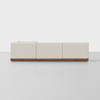 A modern, light beige sofa with a low profile and clean lines, featuring three square seat sections and a wooden base, set against a plain white background.
