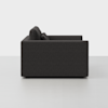 A dark gray, modern sofa viewed from the side against a plain white background. The sofa has clean, straight lines and two back cushions.