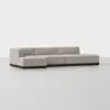 A modern sectional sofa with beige upholstered cushions and a low, dark wooden base, positioned on a light-colored floor against a plain white background.