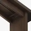Close-up view of a dark wood table or desk showing the underside, including one leg, support beams, and two recessed round buttons or controls set into the wood.
