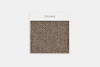 A square fabric swatch with a chunky, woven texture in taupe brown, displayed on a white card labeled THUMA at the top against a plain white background.