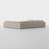 A large, light beige L-shaped sectional sofa with plush cushions, set against a plain white background.