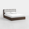A modern bed with a dark wooden frame, a light upholstered headboard, and white bedding, including pillows and sheets, set against a plain white background.