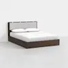 A modern bed with a dark wooden frame, a light upholstered headboard, and white bedding, including pillows and sheets, set against a plain white background.