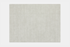 A rectangular, light grey area rug with a soft, even texture, displayed against a white background.