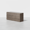 A modern, rectangular, six-drawer dresser made of wood with a light brown finish, set against a plain white background.