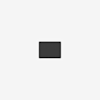 A small, rectangular, dark gray object is centered on a plain white background. The object appears flat and featureless, possibly an electronic device or a minimalistic accessory.